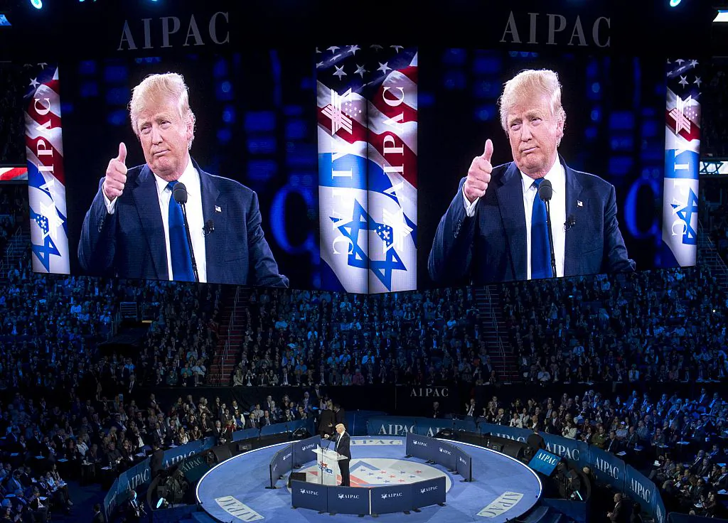 Donald Trump gives a thumbs-up as he addresses the American Israel Public Affairs Committee (AIPAC) 2016 Policy Conference at the Verizon Center in Washington, DC, March 21, 2016. / AFP / SAUL LOEB        (Photo credit should read SAUL LOEB/AFP/Getty Images)