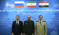 Russia’s Defense Minister Visits Syria, Meets Assad