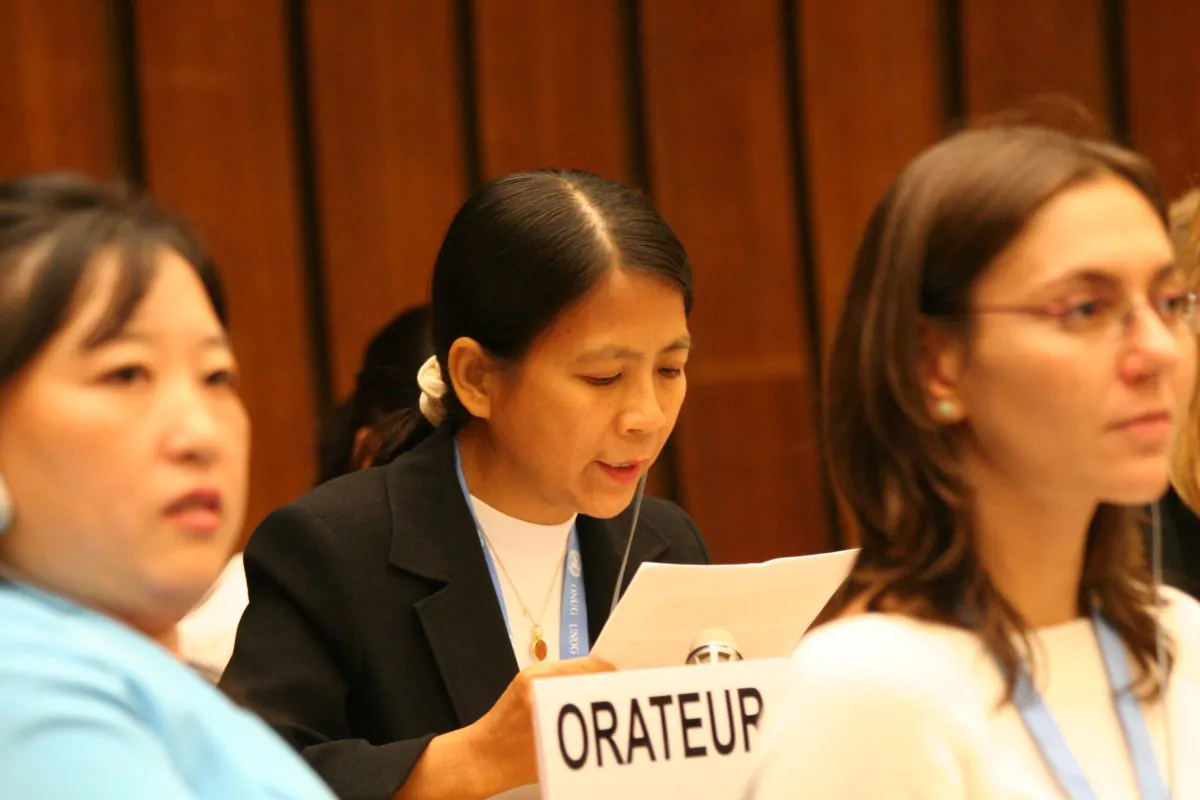GENEVA: Ng Chye Huay, Falun Gong practitioner from Singapore, reads her prepared statement in front of the main plenary of the Second session of the United Nations Human Rights Council on September 20, 2006. She thanked UN Special Rapporteurs for their interventions on behalf of her and other practitioners, and blasted Beijing for its contined abuses of the group. (The Epoch Times)