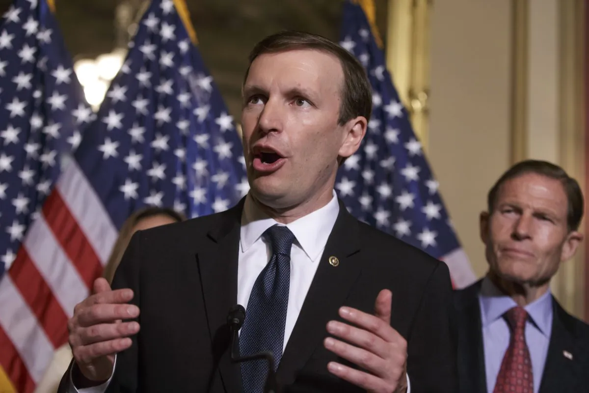 In this June 16, 2016 file photo, Sen. Chris Murphy, D-Conn., left, accompanied by Sen. Richard Blumenthal, D-Conn., speaks on Capitol Hill in Washington. (AP Photo/J. Scott Applewhite, File)