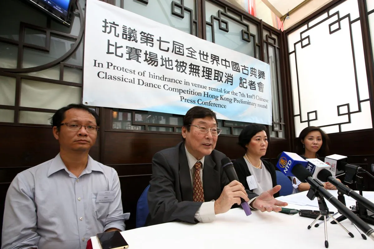 New Tang Dynasty Television and the Hong Kong branch of Epoch Times hold a press conference in Hong Kong's Foreign Correspondents' Club to provide background on the cancellation of a venue for an international dance competition on June 23, 2016. (Poon Zai-shu/Epoch Times)