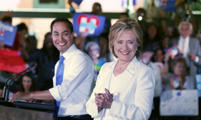Secretary of Housing and Urban Development Secretary Julian Castro introduces Democratic presidential candidate Hillary Clinton at a "Latinos for Hillary" grassroots event October 15, 2015 in San Antonio, Texas. (Photo by Erich Schlegel/Getty Images)