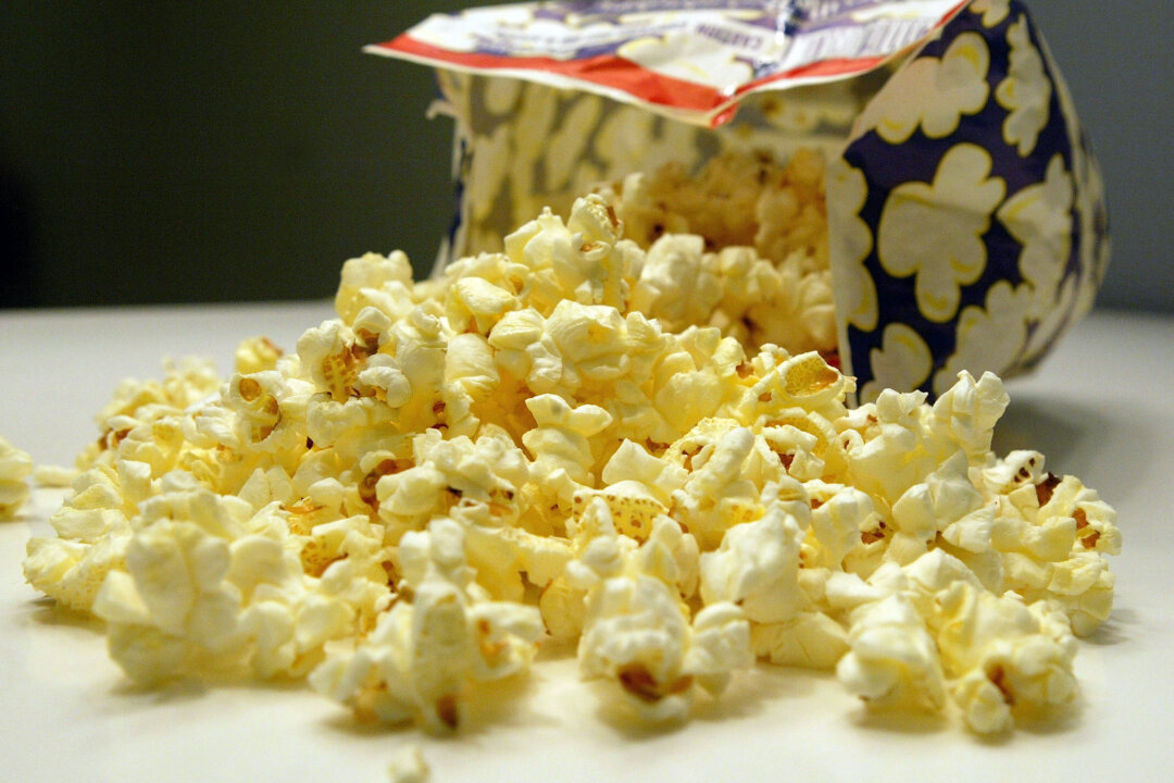 A freshly popped bag of microwave popcorn sits on a table in New York City, on March 12, 2004. (Justin Sullivan/Getty Images)