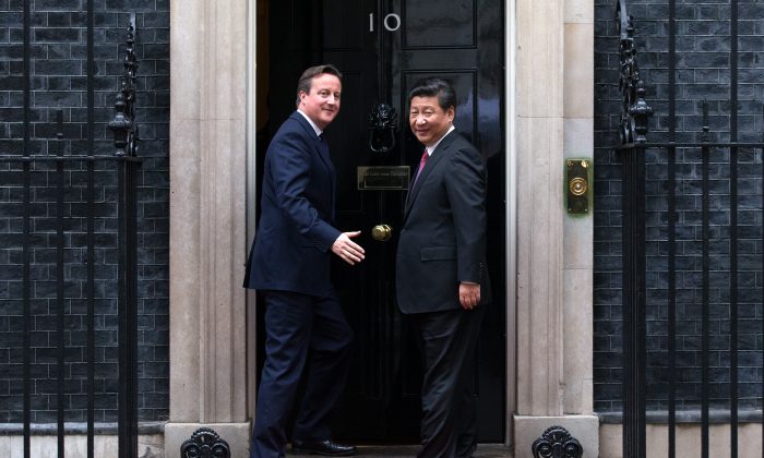 U.K. Prime Minister David Cameron (L) and Chinese Leader Xi Jinping arrive at 10 Downing Street in London on Oct. 21, 2015. With Britain's exit from the EU, China loses its chief ally in Europe. (Carl Court/Getty Images)