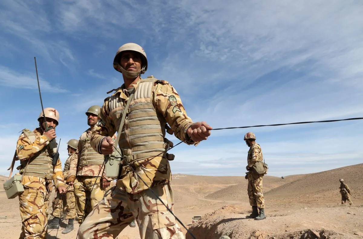 Iranian soldiers participate in military maneuvers on the outskirts of the northeastern Iranian town of Torbat-E-Jam, near Mashhad, on Nov. 17, 2015. (Hossein Hosseinzadeh/AFP/Getty Images)
