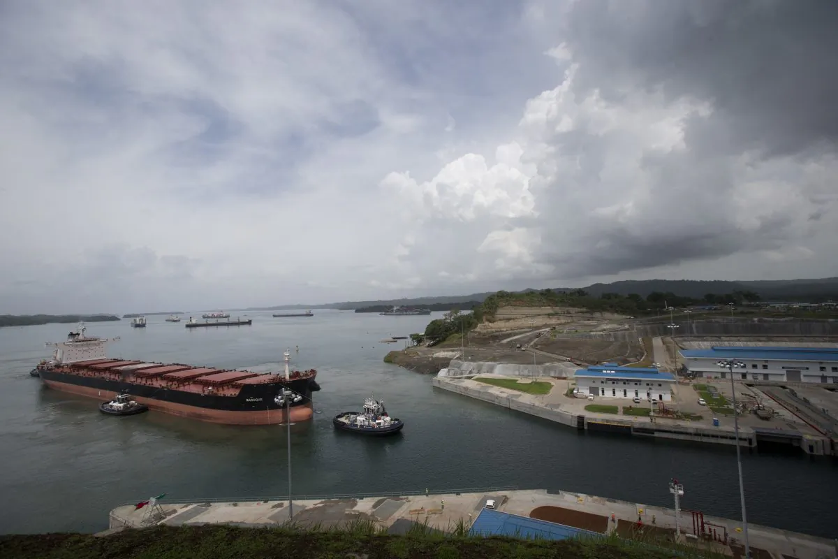 The Malta flagged cargo ship named Baroque, a post-Panamax vessel, arrives to the Agua Clara locks on a test of the newly expanded Panama Canal in Agua Clara, Panama, on June 24, 2016. (AP Photo/Moises Castillo)