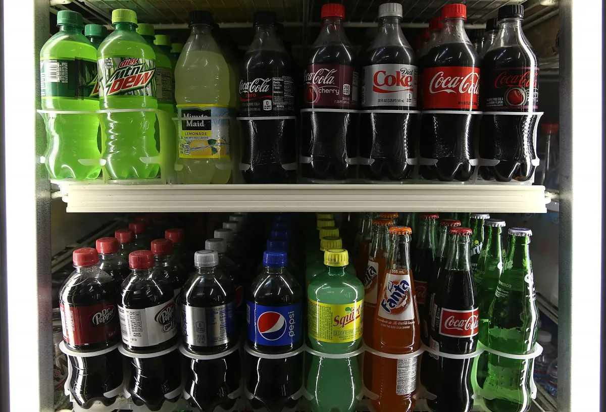 Bottles of soda are displayed in a cooler at a convenience store in San Francisco. (Justin Sullivan/Getty Images)