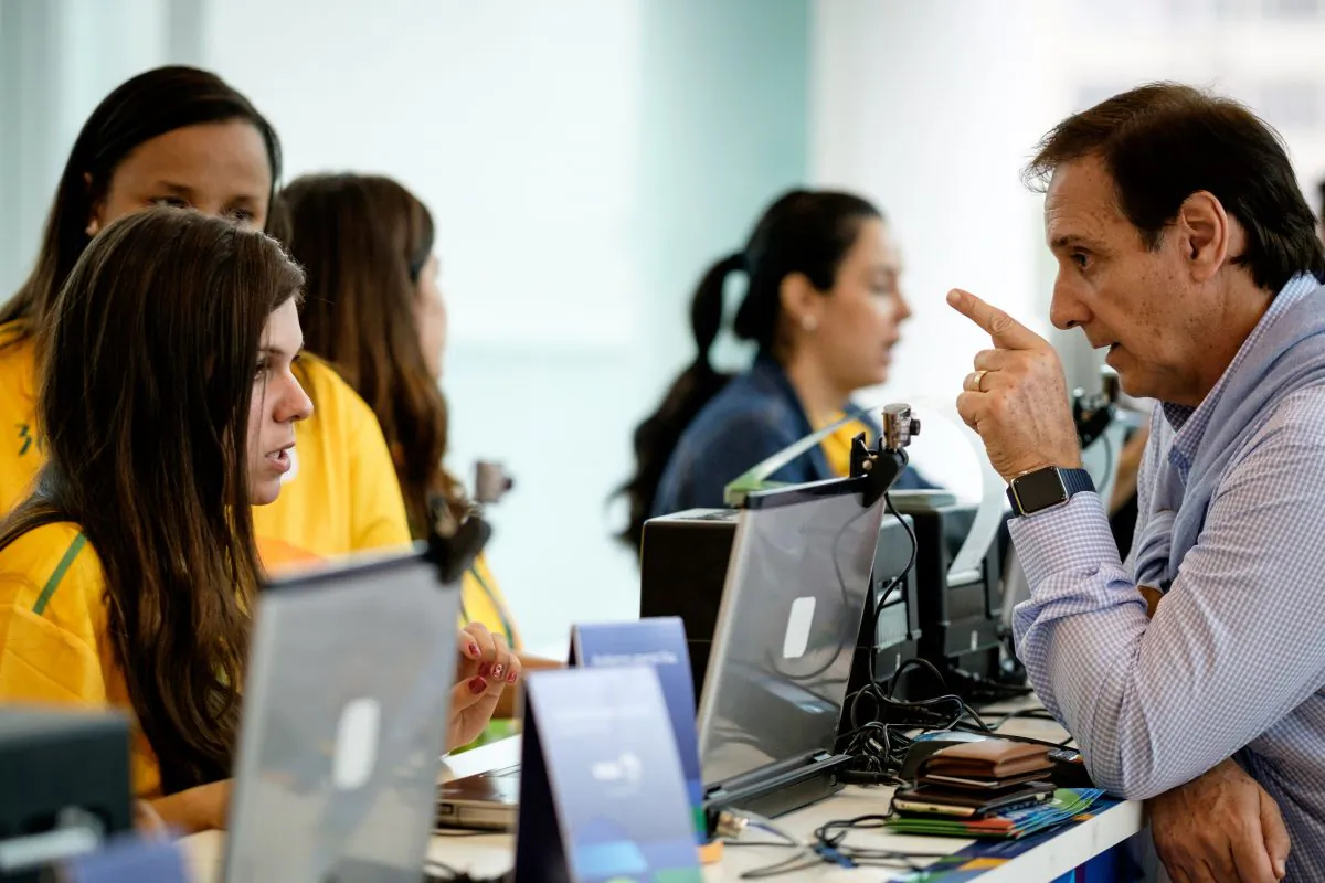 An Argentine gets tickets for the Olympic games at the Shopping Leblon mall in Rio de Janeiro on June 20. (YASUYOSHI CHIBA/AFP/Getty Images)