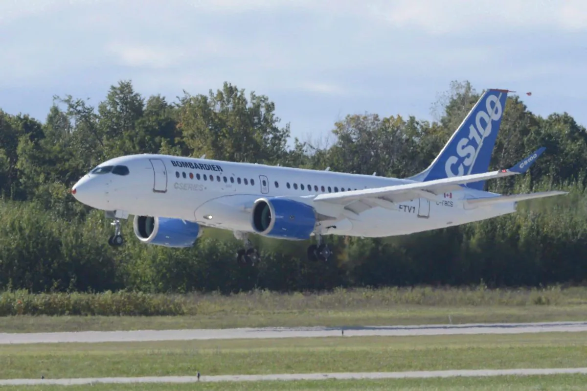 Bombardier's CSeries commercial jet takes off on its first flight in Montreal on Sept. 16, 2013. (The Canadian Press/Ryan Remiorz)