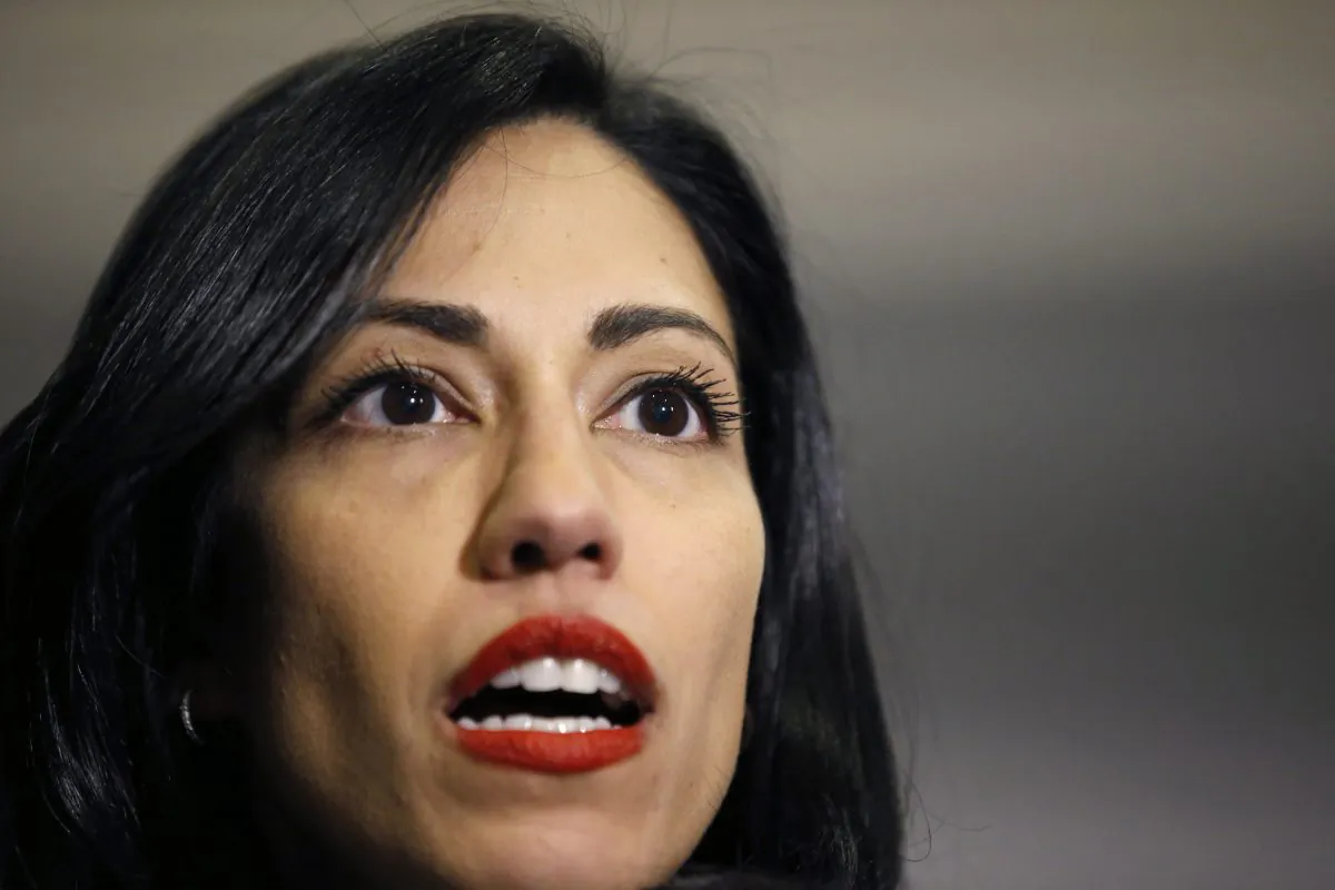 This Oct. 16, 2015, file photo shows Huma Abedin, a longtime aide to Hillary Rodham Clinton, speaking to the media after testifying at a closed-door hearing of the House Benghazi Committee, on Capitol Hill, in Washington. (AP Photo/Alex Brandon,File)