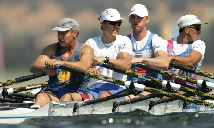 FILE-  In this file photo taken on Tuesday, Aug. 17, 2004, From left: Russia's Sergei Fedorovtsev, Alexeij Svirin, Igor Kravtsov and Nikolai Spinev train for the Men's Quad Sculls event at the 2004 Olympics Games at the Schinias Rowing & Canoeing Center in Schinias near Athens, Greece. The World Rowing Federation says that trimetazidine, a banned substance, was found in a urine sample given by rower Sergei Fedorovtsev in an out-of-competition test on May 17. (AP Photo/Armando Franca, file)