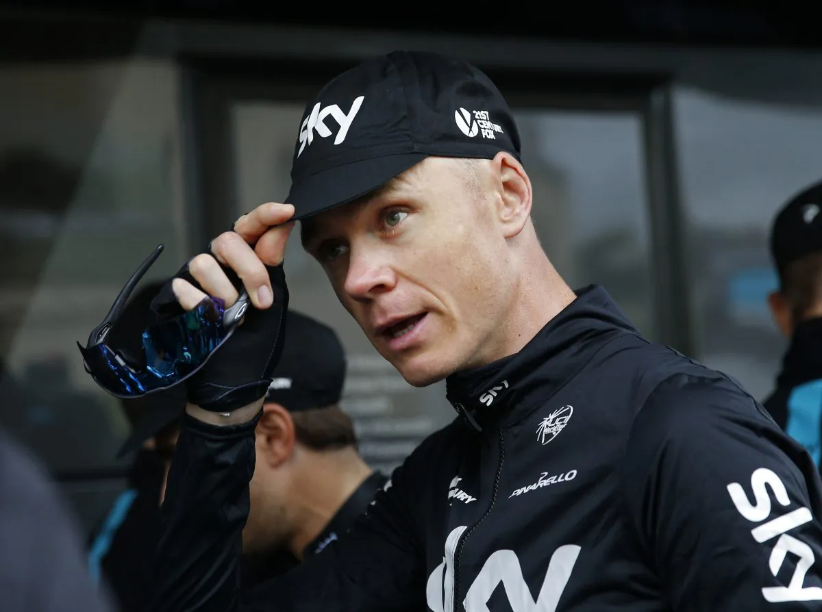 Sky's Chris Froome adjusts his cap prior to a training ride two days before the start of the Tour de France cycling race, near Port-en-Bessin-Huppain, France, Thursday, June 30, 2016. (AP Photo/Christophe Ena)