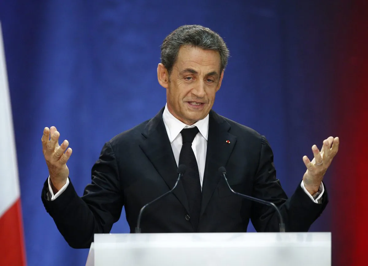 Former French President Nicolas Sarkozy speaks as part of his campaign for the leadership of his conservative UMP party in Lambersart, northern France on Sept. 25, 2014. (AP Photo/Michel Spingler)