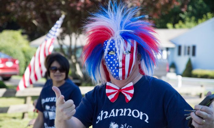 A member of the Shannon family marching in the Fourth of July Parade in Circleville on July 4, 2016. (Holly Kellum/Epoch Times)