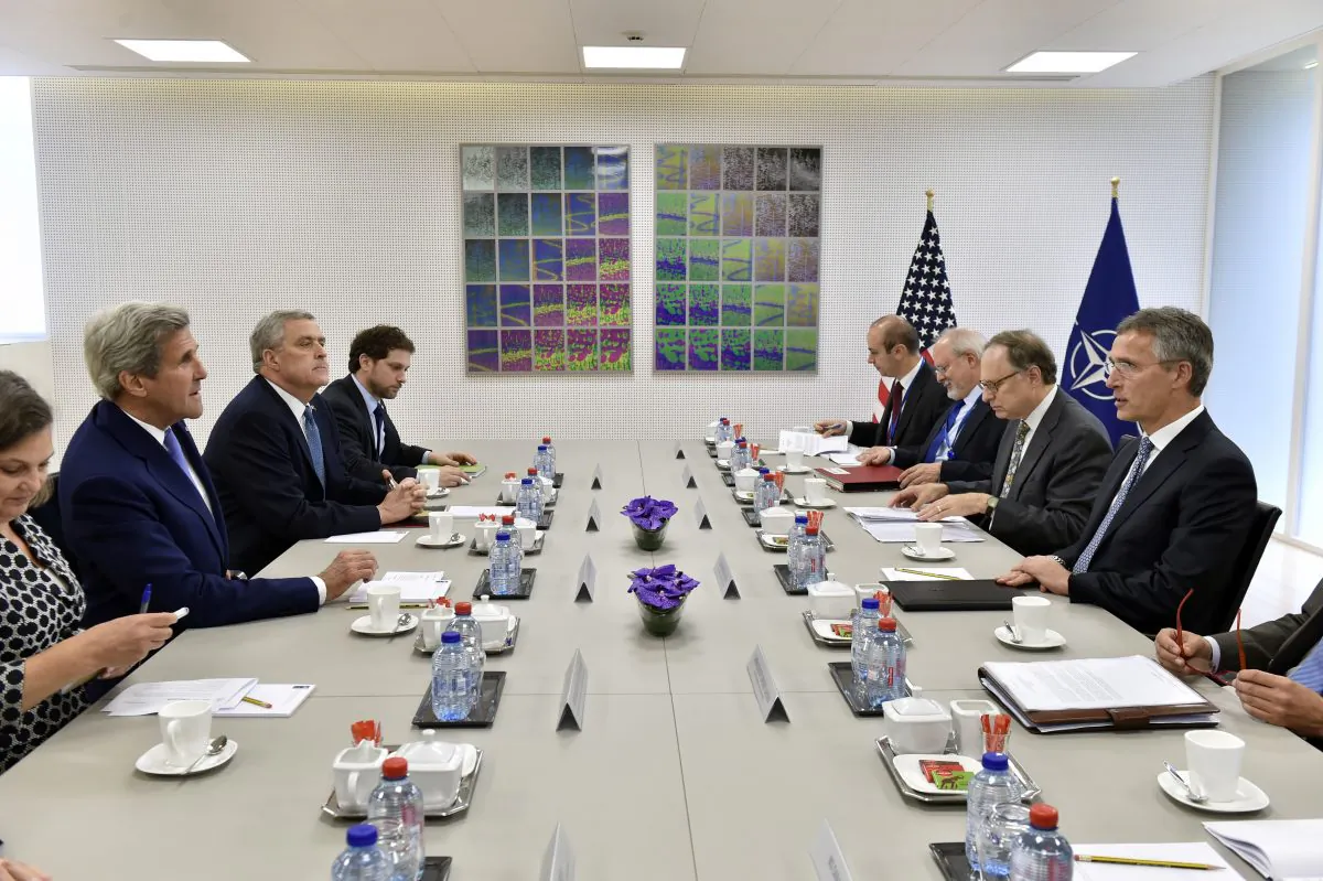U.S. Secretary of State John Kerry, left, meets with NATO Secretary General Jens Stoltenberg, right, at NATO headquarters in Brussels, on Monday, June 27, 2016. (Eric Vidal, Pool Photo via AP)