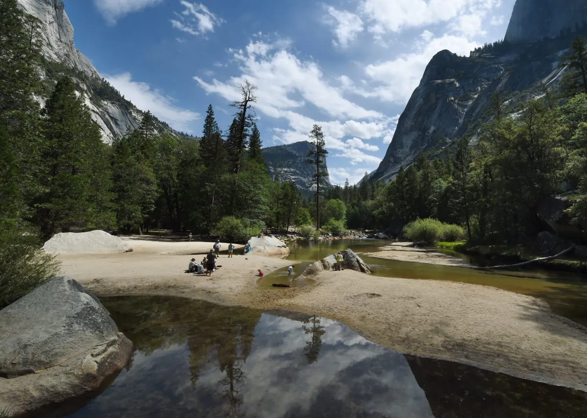People picnic on the exposed sandy bottom of Mirror Lake at Yosemite National Park in California on June 4, 2015. (Mark Ralston/AFP/Getty Images)