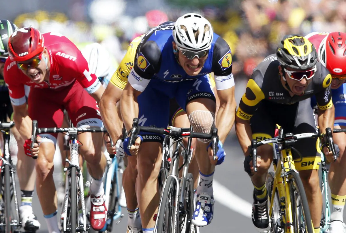 Etixx-Quickstep sprinter Marcel Kittel, center, leads Direct Energie’s Brian Coquard, right, and Katusha’s Alexander Kristoff (left) toward the finish line during Stage Four of the Tour de France, 237.5 kilometers (147.3 miles) from Saumur to Limoges, France, Tuesday, July 5, 2016. (AP Photo/Christophe Ena)