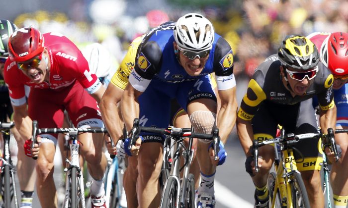 Etixx-Quickstep sprinter Marcel Kittel, center, leads Direct Energie’s Brian Coquard, right, and Katusha’s Alexander Kristoff (left) toward the finish line during Stage Four of the Tour de France, 237.5 kilometers (147.3 miles) from Saumur to Limoges, France, Tuesday, July 5, 2016. (AP Photo/Christophe Ena)