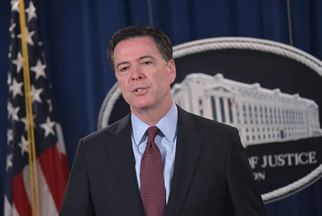 FBI Director James Comey speaks during a press conference at the Department of Justice on March 24, 2016 in Washington, DC. 
US Attorney General Loretta Lynch announced the unsealing of an indictment of seven Iranians on computer hacking charges. / AFP / MANDEL NGAN        (Photo credit should read MANDEL NGAN/AFP/Getty Images)