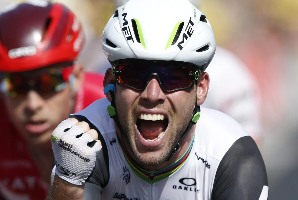 Dimension Data sprinter Mark Cavendish celebrates as he crosses the finish line to win Stage Six of the Tour de France, 190.5 kilometers (118.1 miles) from Arpajon-sur-Cere to Montauban, France, Thursday, July 7, 2016. (AP Photo/Christophe Ena)