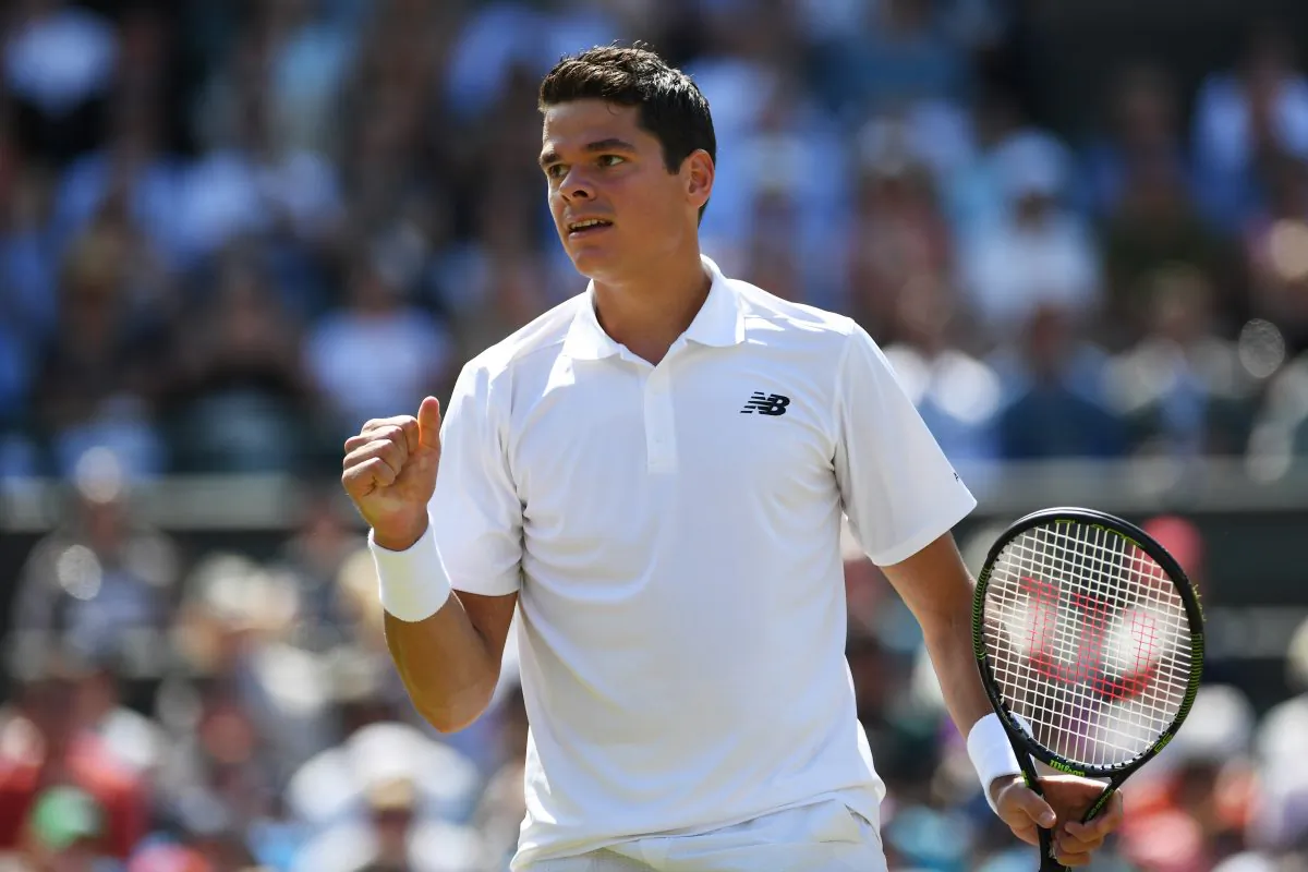 Milos Raonic of Canada celebrates victory during the Men’s Singles quarter-final match of the 2016 Wimbledon Championships in London, on July 6. (Shaun Botterill/Getty Images)