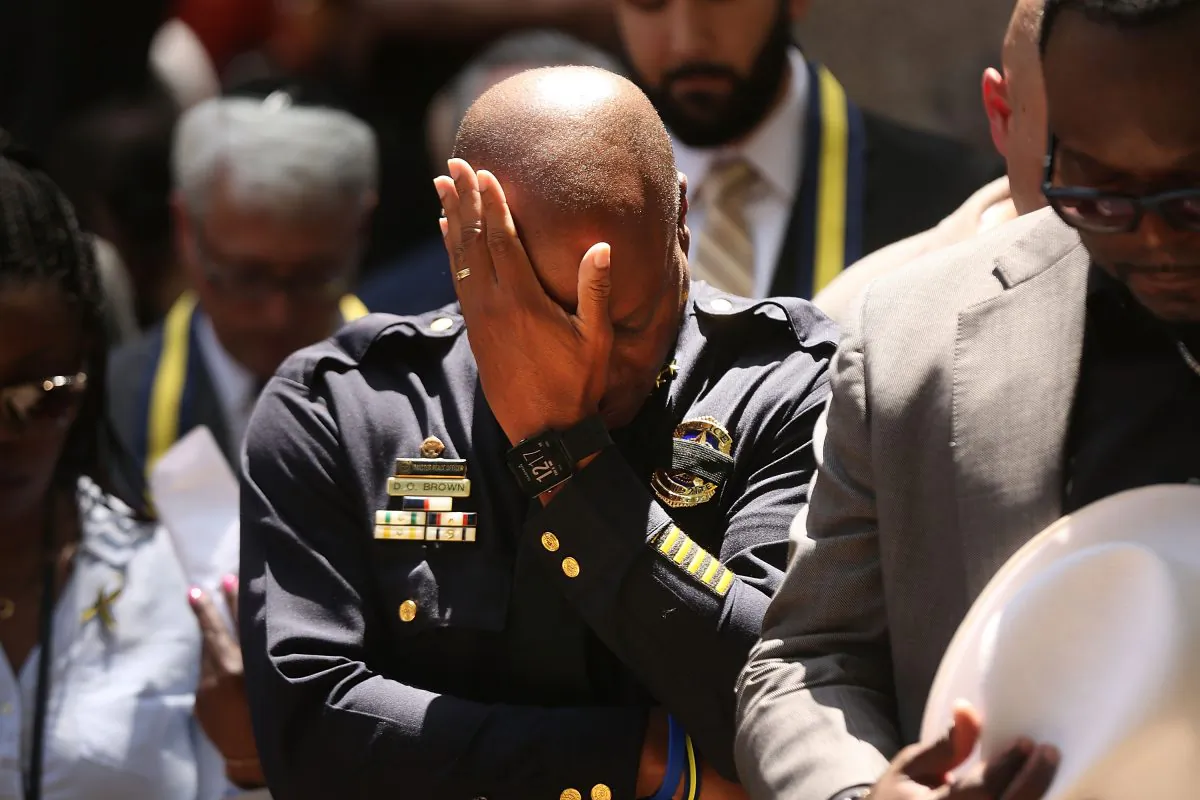 Dallas Police Chief David Brown pauses at a prayer vigil following the deaths of five police officers last night during a Black Live Matter march on July 8, 2016 in Dallas, Texas. Five police officers were killed and seven others were injured  in a coordinated ambush at a anti-police brutality demonstration in Dallas. Investigators are saying the suspect is 25-year-old Micah Xavier Johnson of Mesquite, Texas. This is the deadliest incident for U.S. law enforcement since September 11.  (Photo by Spencer Platt/Getty Images)