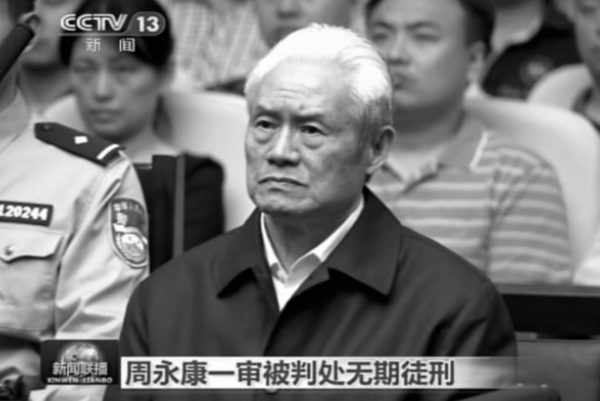 Zhou Yongkang, formerly the Chinese Communist Party Politburo Standing Committee member in charge of security, sits in a courtroom at the First Intermediate People's Court of Tianjin in Tianjin, China, on June 11, 2015. Zhou was sentenced to life in prison. (CCTV via AP)