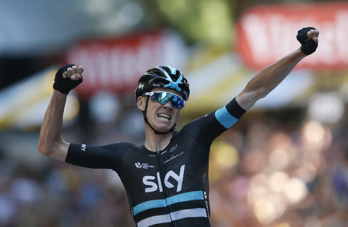 Sky’s Chris Froome celebrates as he crosses the finish line to win Stage Eight of the 2016 Tour de France, 184 kilometers (114.3 miles) from Pau to Bagneres-de-Luchon, France, Saturday, July 9, 2016. (AP Photo/Christophe Ena)