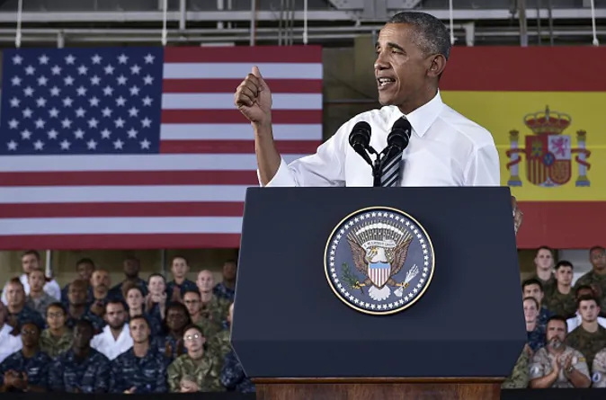 US President Barack Obama speaks to service members at the Naval Station Rota, in Rota, southwestern Spain on July 10, 2016. Obama said he will cut short a foreign trip and visit Dallas next week as the shooting rampage by the black army veteran, who said he wanted to kill white cops, triggered urgent calls to mend troubled race relations in the United States. / AFP / MANDEL NGAN (Photo credit should read MANDEL NGAN/AFP/Getty Images)