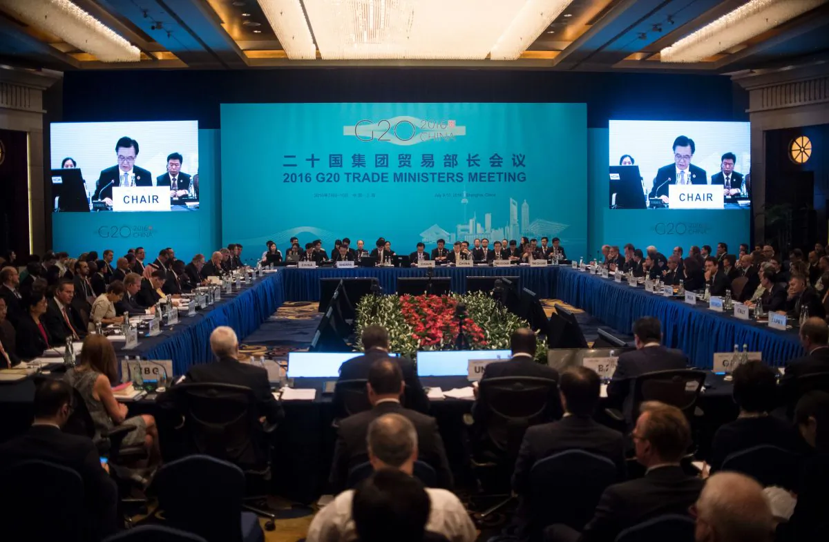 China's Commerce Minister Gao Hucheng (top C) delivers a speech during the opening ceremony of the G20 Trade Ministers Meeting in Shanghai on July 9, 2016. (Johannes Eisele/AFP/Getty Images)