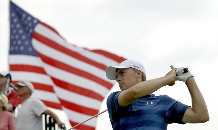 FILE - In this June 16, 2016, file photo, Jordan Spieth watches his tee shot on the third hole during the first round of the U.S. Open golf championship at Oakmont Country Club in Oakmont, Pa. Spieth is out of the Olympics. International Golf Federation president Peter Dawson announced the decision at the British Open. Spieth had been strongly debating whether to go over the last three days before reaching his decision on Monday, July 11, 2016. He will be replaced by Matt Kuchar.  (AP Photo/Charlie Riedel, File)