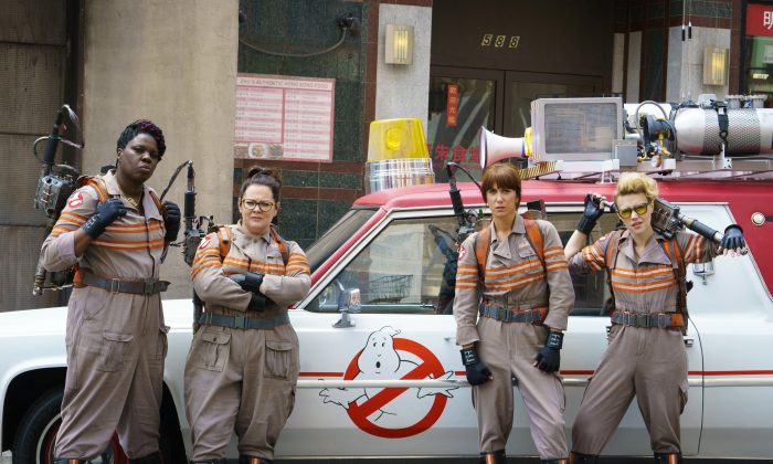In this image released by Sony Pictures, from left, Leslie Jones, Melissa McCarthy, Kristen Wiig and Kate McKinnon appear in a scene from the film, "Ghostbusters," opening nationwide on July 15. (Hopper Stone/Columbia Pictures, Sony via AP)