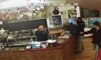 Video: Store Owner Ignores Armed Robber, Serves His Customer Instead