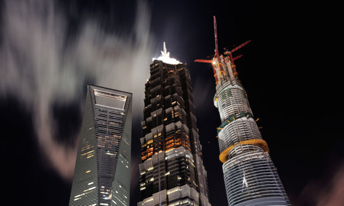(L-R)Shanghai World Financial Center, Jin Mao Tower and Shanghai Tower. (via ChinaNews)