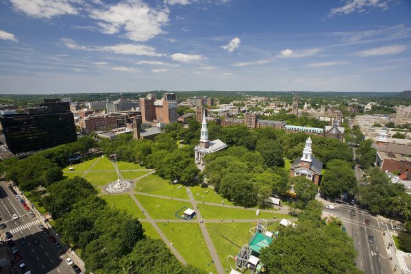 An aerial view of the New Haven Green, a park in downtown New Haven. It hosts outdoor festivals during the summer. (Courtesy of Market New Haven)