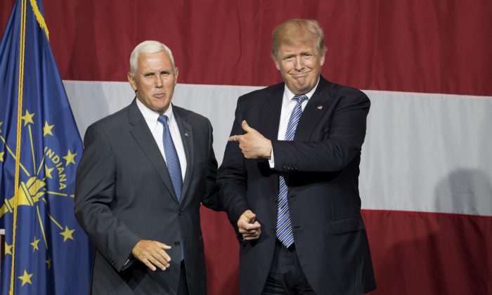 Presumptive US Republican presidential candidate Donald Trump (R) and Indiana Governor Mike Pence (L) during a campaign rally at Grant Park Event Center in Westfield, Indiana, on July 12, 2016.  (TASOS KATOPODIS/AFP/Getty Images)