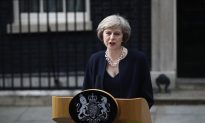 British PM May Removes Another Cameron Supporter as Minister