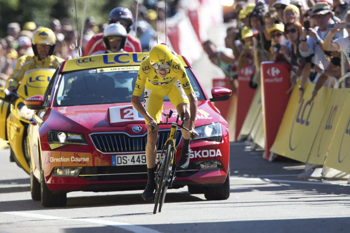Sky's Chris Froome crosses the finish line of Stage 13 of the 2016 Tour de France, an individual time trial of 37.5 kilometers (23 miles) between Bourg-Saint-Andeol and La Caverne du Pont-d'Arc, France, Friday, July 15, 2016. (AP Photo/Peter Dejong)
