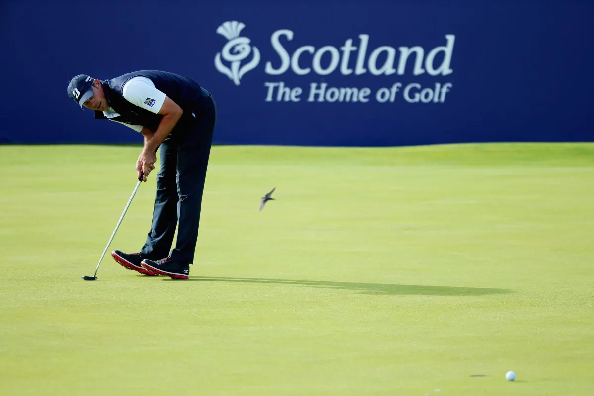 Matt Kuchar reacts to his putt on the 18th green during the second round of the Aberdeen Asset Management Scottish Open at Gullane Golf Club in Gullane, East Lothian, Scotland, on July 10, 2015. (Andrew Redington/Getty Images)