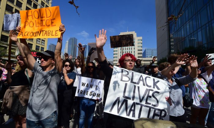 Hundreds gather for a Black Lives Matter rally outside Los Angeles Police Department headquarters on July 12, 2016 in Los Angeles, Calif. (Frederic J. Brown/AFP/Getty Images)