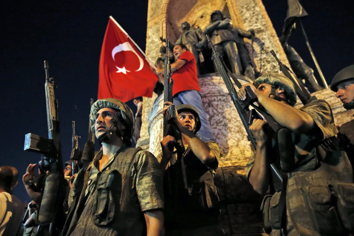 Turkish soldiers secure the area as supporters of Turkey's President Recep Tayyip Erdogan protest in Istanbul's Taksim square, early  July 16, 2016. " (AP Photo/Emrah Gurel)