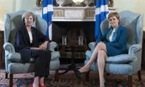 British PM May Removes Another Cameron Supporter as Minister