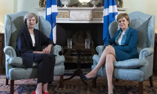 British PM May Removes Another Cameron Supporter as Minister