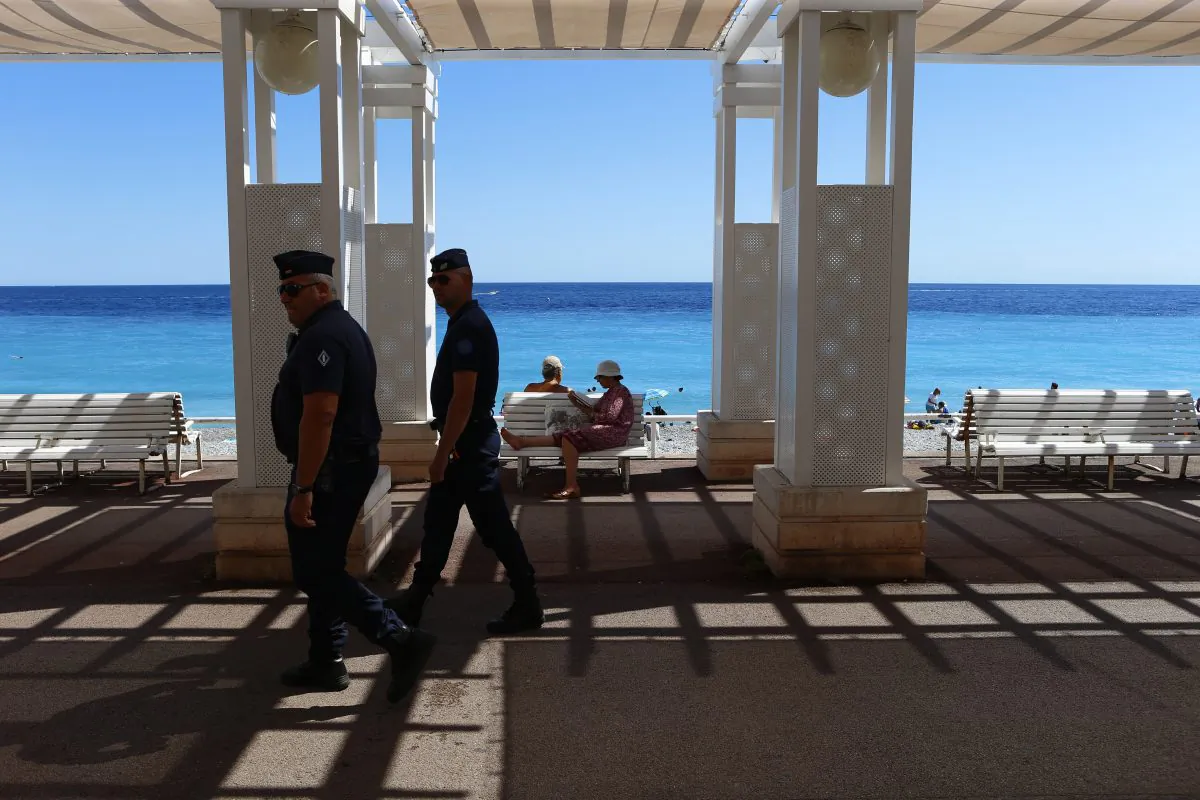 Police patrol near the scene of a truck attack on the famed Promenade des Anglais in Nice on July 16. (AP Photo/Francois Mori)