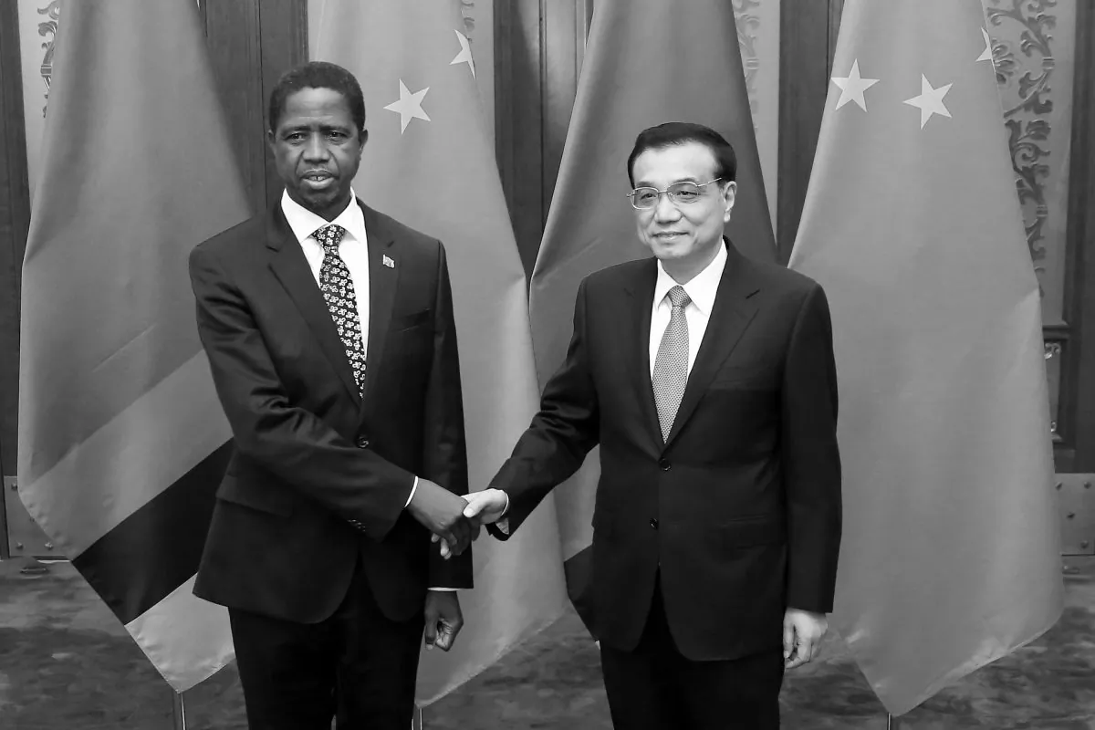 Chinese Premier Li Keqiang (R) shakes hands with Zambia's President Edgar Chagwa Lungu at the Great Hall of the People in Beijing, China, on March 30, 2015. (Feng Li/Getty Images)