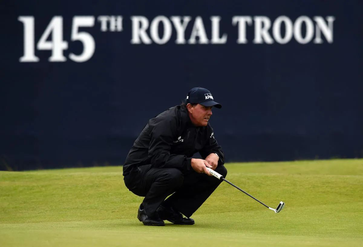Phil Mickelson lines up a putt on the 18th green during his second round 69 on day two of the 2016 British Open Golf Championship at Royal Troon in Scotland on July 15. (Andy Buchanan/AFP/Getty Images) 
