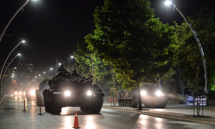 Turkish army tanks move in the main streets of Ankara in the early morning hours of July 16, 2016. Istanbul's bridges across the Bosphorus Strait, separating the European and Asian sides of the city, have been closed to traffic. (Gokhan Sahin/Getty Images)