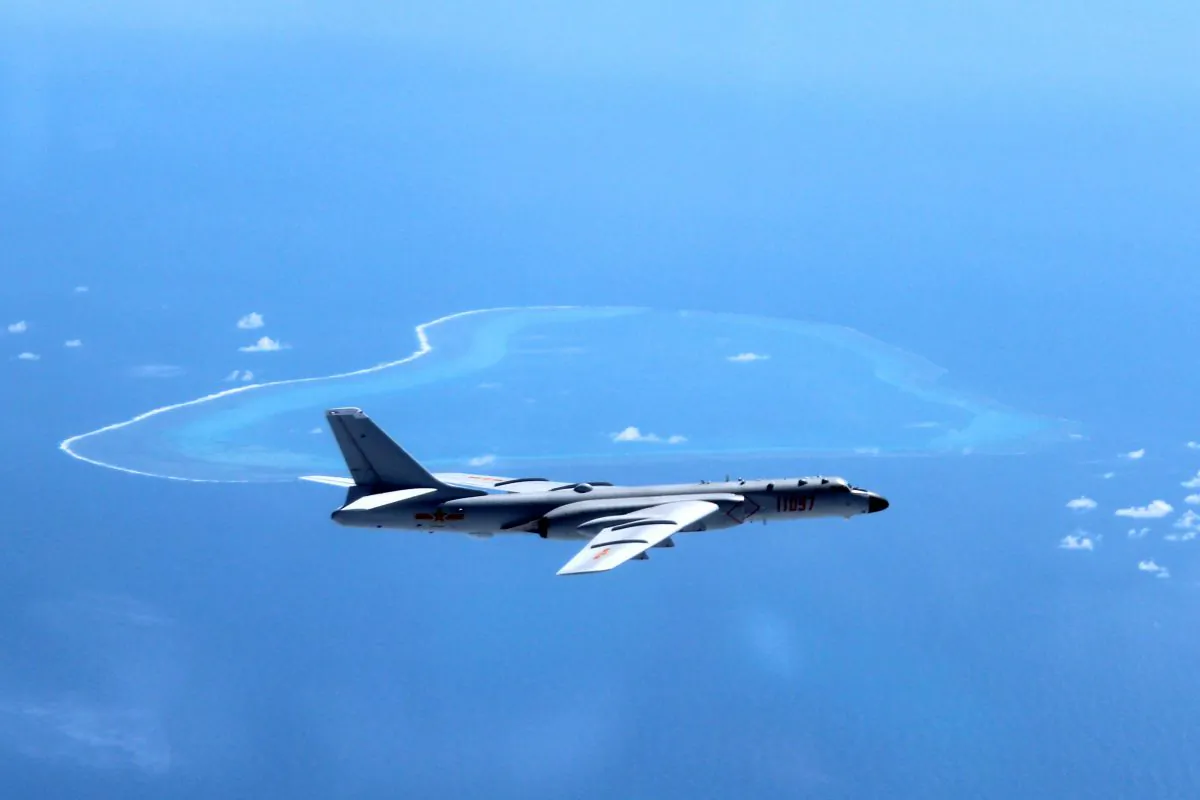 A Chinese H-6K bomber patrols the islands and reefs in the South China Sea. (Liu Rui/Xinhua via AP)