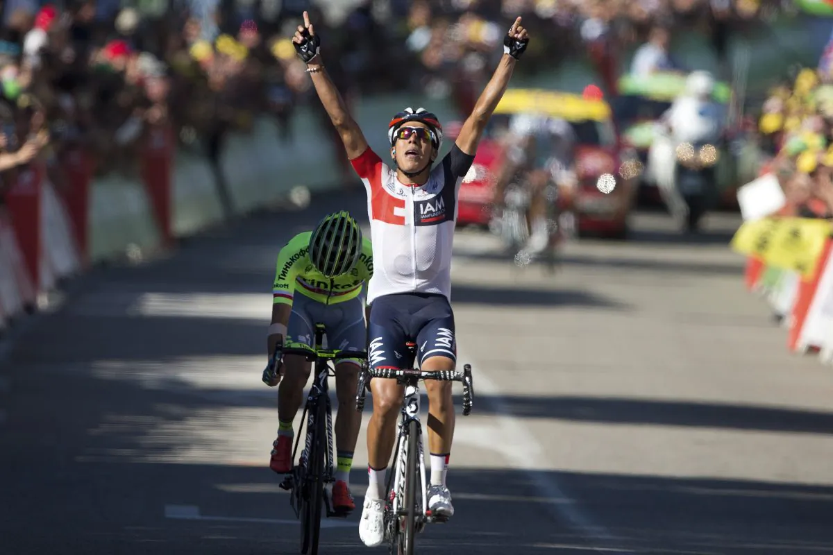 IAM’s Jarlinson Pantano celebrates as he crosses the finish line ahead of Tinkoff’s Rafal Majka to win Stage 15 of the 2016 Tour de France, 160 kilometers (99.4 miles) from Bourg-en-Bresse to Culoz, France, Sunday, July 17, 2016. (AP Photo/Peter Dejong)