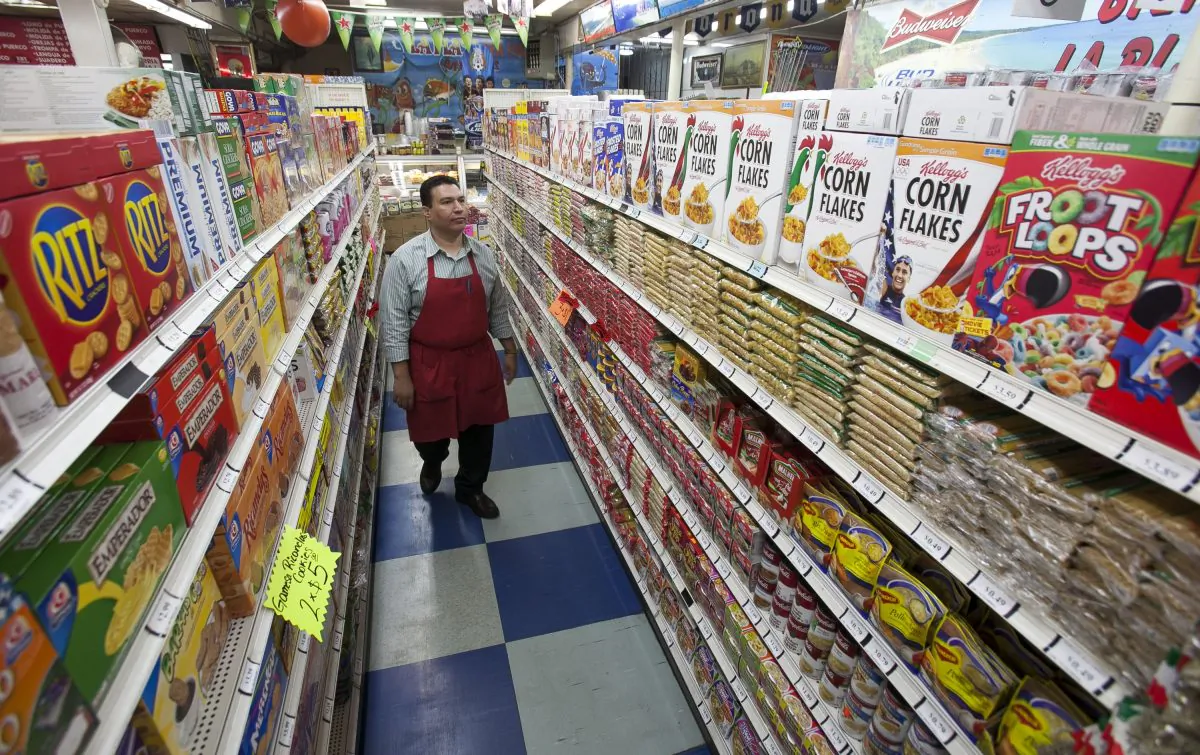 Grocery market owner Ray Martinez at La Playa Market in Inglewood, Calif., on Nov. 1, 2012. Martinez opposed a GMO labeling proposal in California. (AP Photo/Damian Dovarganes)